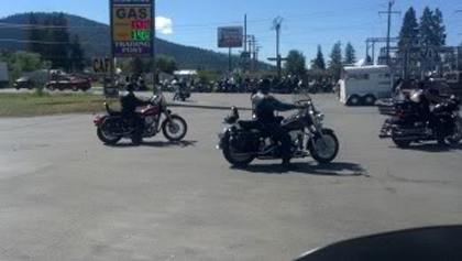 Couple of riders on their motorcycles.