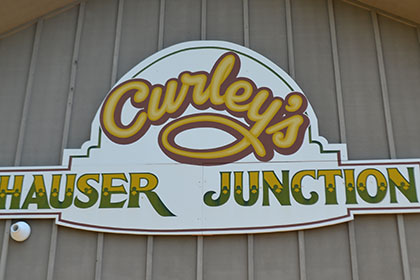 Photo of Curley's Hauser Junction sign.
