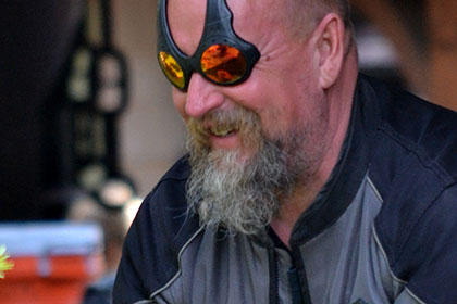 Bearded man with unique sunglasses.