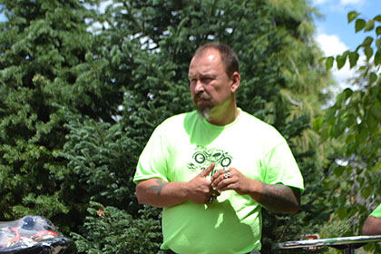 A Ride for Life committee member with a microphone in his pocket.