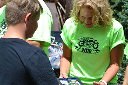 Child with some Ride for Life committee members.