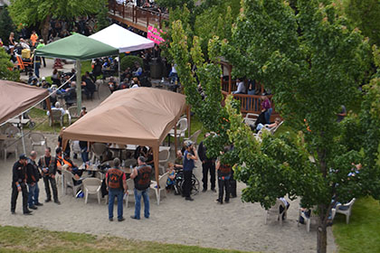 Oviewview of the event with people and tents.