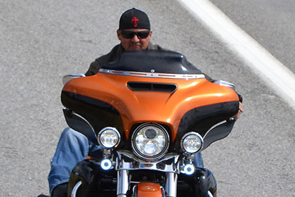 A man on his motorcyle.
