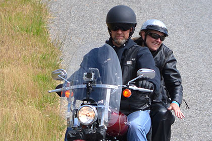 Two people on a motorcyle.